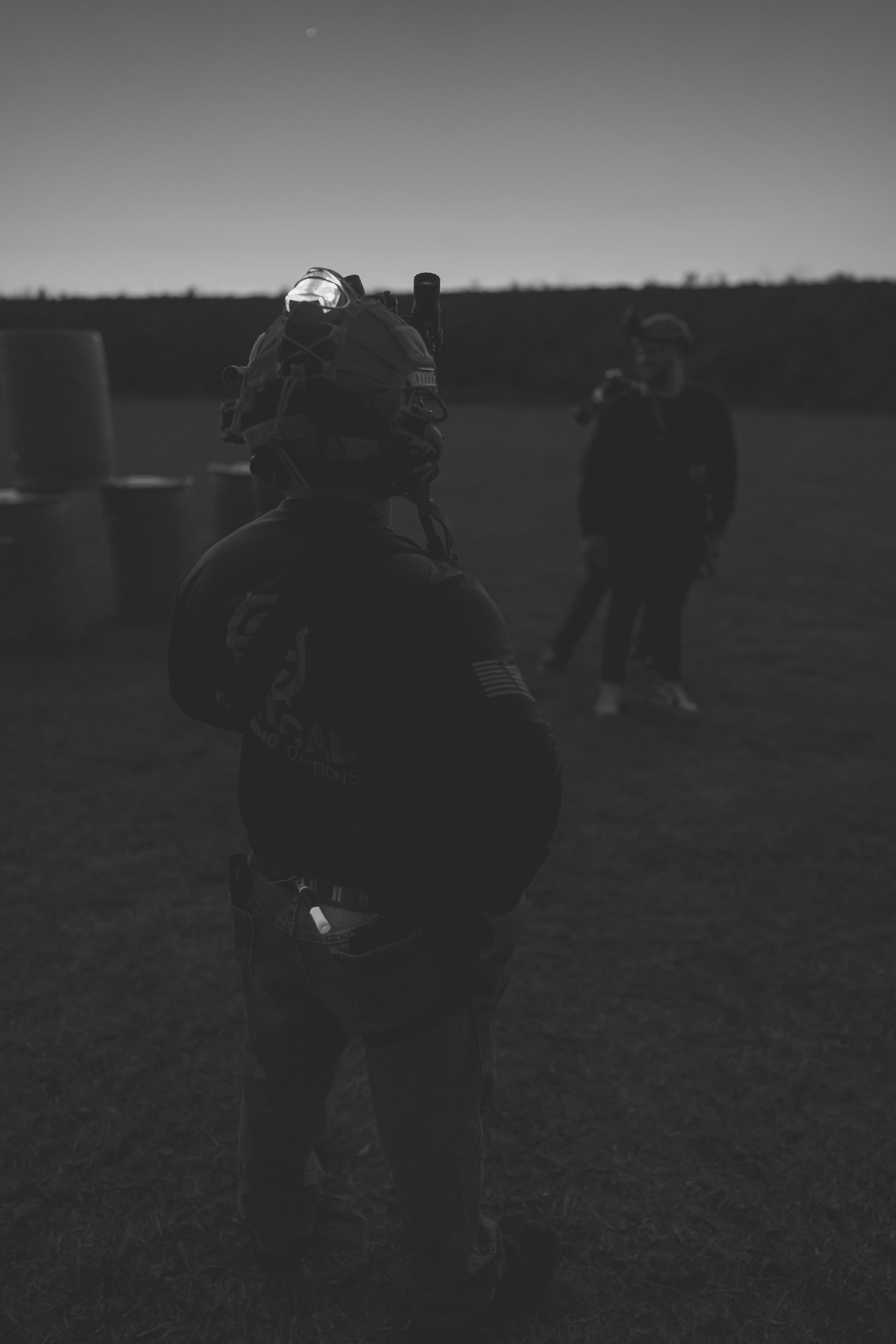 CTS instructor from behind in NVG gear during low-light operations